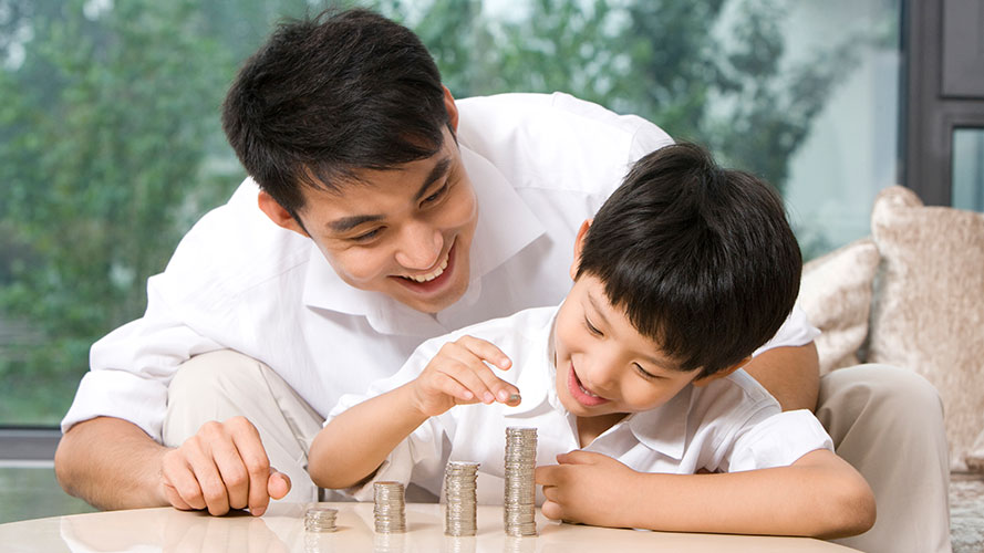 father-and-son-calculating-coins-pwsimg-8601